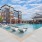 outdoor swimming pool with a tanning shelf at Bainbridge Market Commons in Frederick, MD