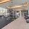 Bainbridge Market Commons on-site fitness center with cardio machines and weight equipment